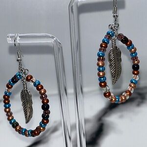 Beaded Hoop Earrings with Silver Feather Charm